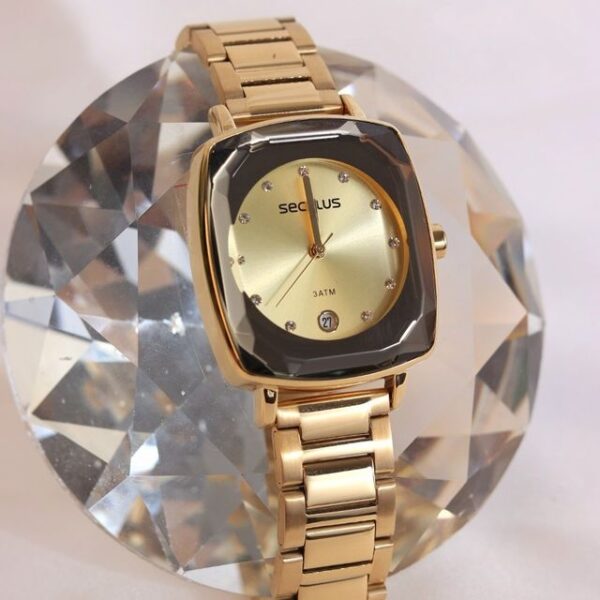 Cor da pulseira: Dourado